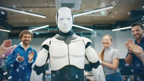 Robot standing in center while diverse team applauding in bright office. Group Stock Footage 322528288
