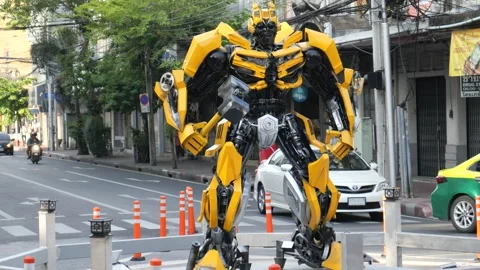 Robot standing at the middle of roundabout of the road Stock Footage 256207794