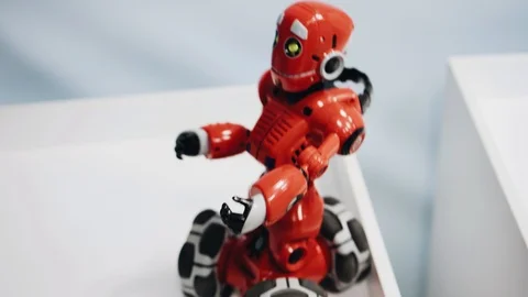 Robot toy red in motion. Robotics. Smart devices. Electrical engineering. 스톡 동영상 120090365