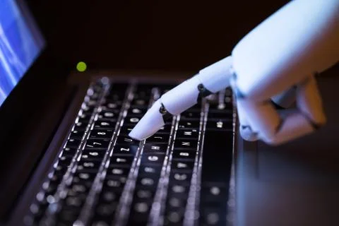 Robot Typing On Laptop 스톡 사진