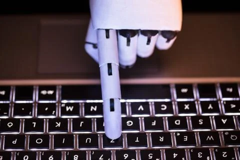 Robot Typing On Laptop 스톡 사진