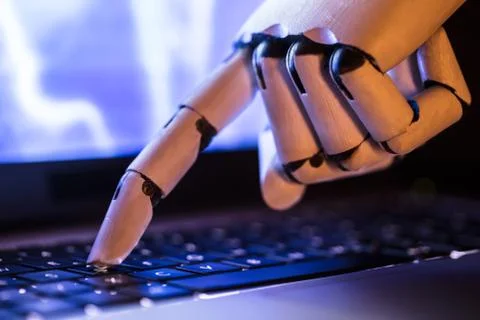 Robot Typing On Laptop 스톡 사진