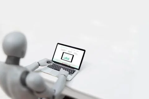 Robot using laptop - Artificial inteligence concept Stock Photos