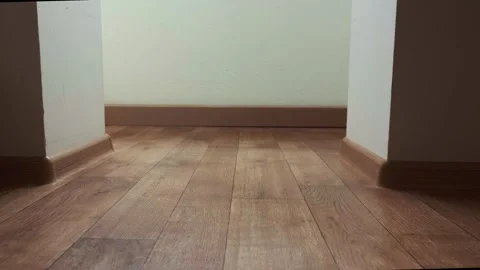 Robot vacuum and mop cleans the home maintaining cleanliness and comfort with Stock Footage 314641879