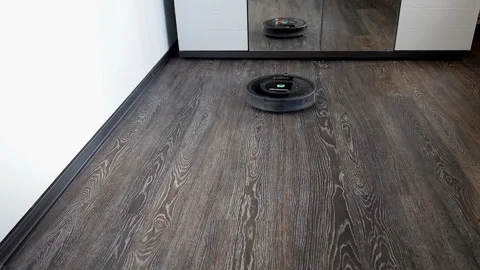 Robot vacuum cleaner is cleaning Stock Footage 108032502