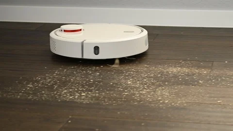 Robot vacuum cleaner cleans the floor Stock Footage 119372189