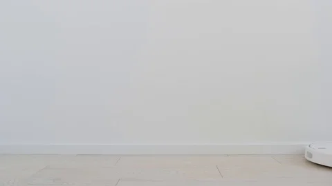 Robot vacuum cleaner moves. Smart home technology Stock-Footage 129254441