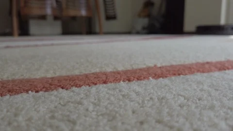 Robot vacuum cleaner moving on the floor. Stock Footage 119164312