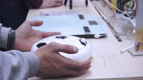 Robot vacuum cleaner in the store Stock Footage 82584556