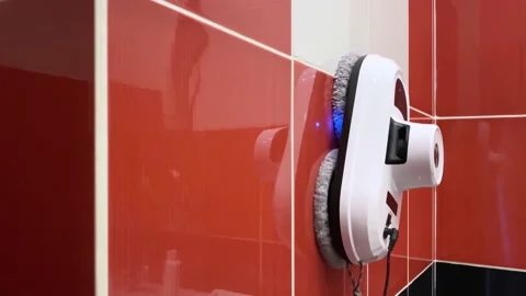 Robot vacuum cleaner washing ceramic tile Stock Footage 169093030
