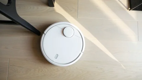 The robot vacuum cleaner works Stock Footage 106749083