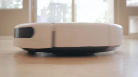 Robot Vacuum Cleans Hardwood Floor Stock Footage 80408162