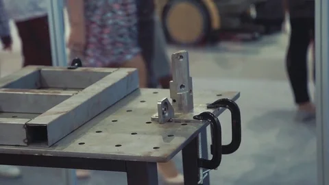 Robot welder at the exhibition of innovations Stock Footage 77553253