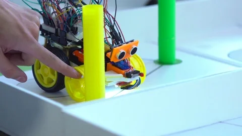 Robot on wheels constructed by programmers at a robotics competitions. Stock Footage 80949369