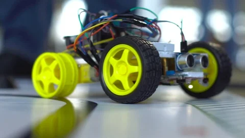 Robot on wheels constructed by programmers at a robotics competitions. Stock Footage 80949576