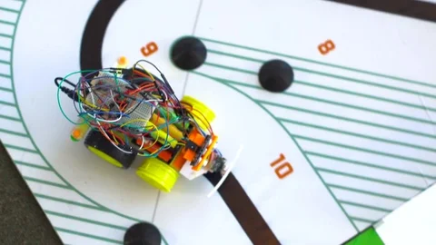 Robot on wheels constructed by programmers at a robotics competitions. Stock Footage 80952701