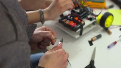 Robot on wheels constructed by programmers at a robotics competitions. Stock Footage 80953713