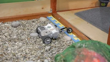 Robot on wheels constructed by programmers at a robotics competitions. Video stock 85552488