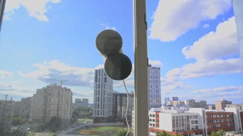 Robot window cleaner washes glass with round rags, robotic service, modern Stock Footage 281815358