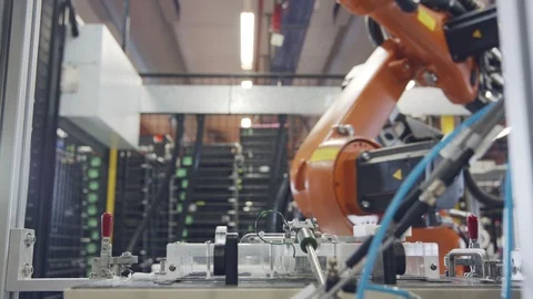 Robot working in an electronics manufacturing facility Stock Footage 100467003