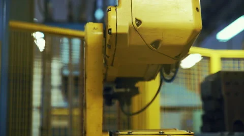 Robot working on a factory Stockbeeldmateriaal 50049923