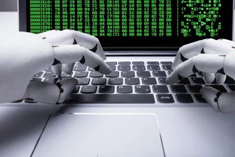 Robot Working On Laptop Foto stock