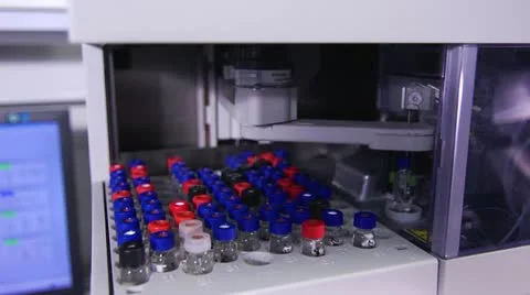  Robotic Analyzer Sampling Liquid from Glass Vessel Stock Footage 11137676