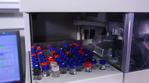  Robotic Analyzer Sampling Liquid from Glass Vessel Stock Footage 11139322