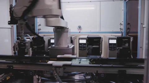 Robotic Arm Assembling Microchip Electronics Close Up Macro Inside Factory Stock Footage 142136228