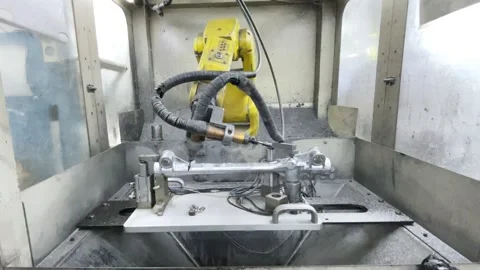 Robotic Arm Assembling Shock Absorber Parts in Motorcycle Manufacturing Facility Stock Footage 308925144