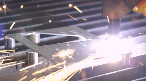 Robotic arm cutting through plate of steel Stock Footage 60443051
