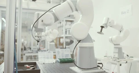 Robotic arm doing repetitive task Stock Footage 121705930