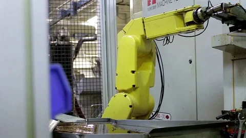 Robotic arm in a factory Stock Footage 77631076