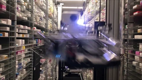 Robotic arm loads medicines in a pharmacy warehouse Stock Footage 101848610
