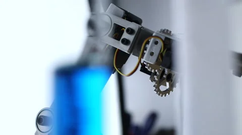 Robotic Arm manipulating chemicals Stock Footage 64353544