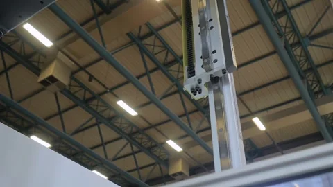 Robotic arm manipulator with suction cups moves plastic containers: close up Stock Footage 341313395