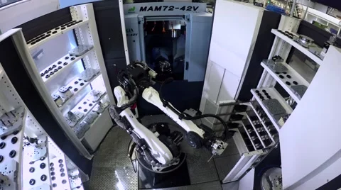 Robotic arm picking up object and moving it Stock Footage 60255658