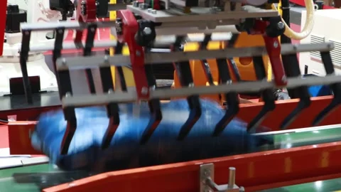 Robotic arm picks up large sacks of goods and transports them to the cargo .. Stock Footage 316767792