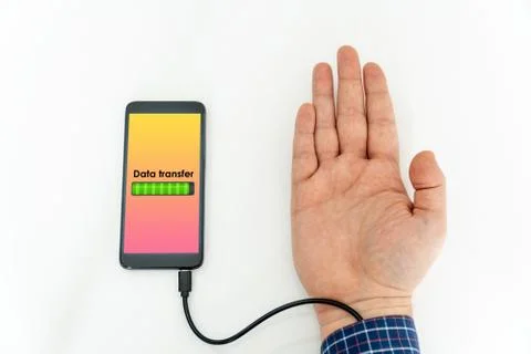 Robotic arm transfering data form a cellphone concept Stock Photos