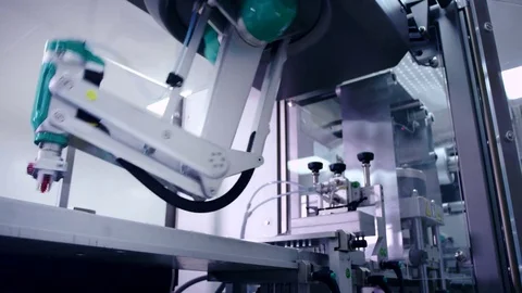 Robotic arm working at automated production line. Modern technology Stock Footage