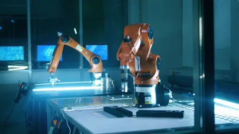 Robotic arms are relocating objects in a science lab Video stock 146772685