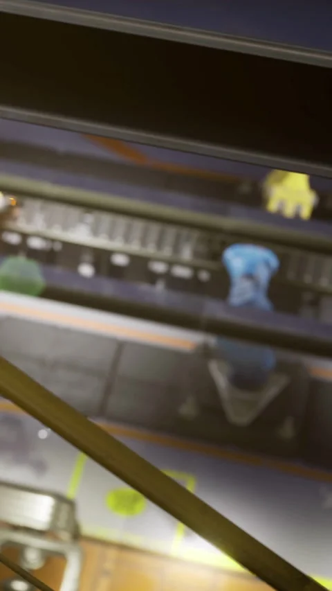 Robotic arms work together in a modern factory during bright daylight hours Stock Footage 334215436
