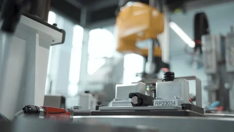 Robotic arms working on a production line at automotive factory Stock Footage 221559324