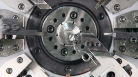 Robotic Automatic Machine Making steel springs, metal spring Manufacturing Stock Footage 120133001