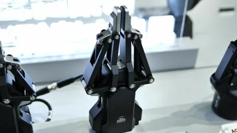 Robotic bionic hands on display at tech expo. Stockbeeldmateriaal 344275271