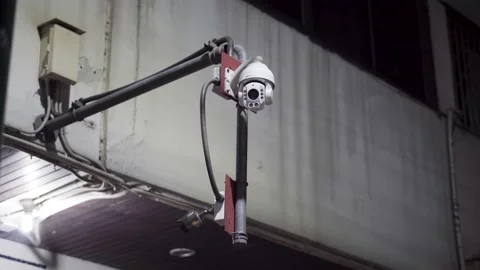 Robotic CCTV camera pans Stock Footage 205584398