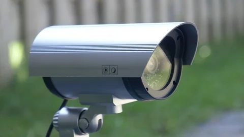 Robotic CCTV Security Video Camera Moving Outside Stock Footage 116185698