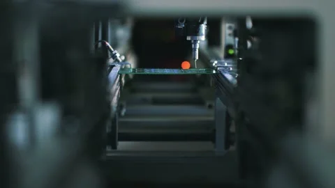 Robotic chip manufacturing. Automatic electronic soldering of microchips. Stock Footage 131124986
