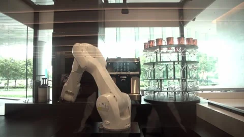 Robotic coffee barista preparing coffee for customer at a coffee shop. Video stock 308864494