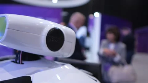 Robotic device with camera sensor at tech show Stock Footage 346223905